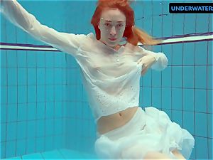 ginger-haired Diana steaming and crazy in a white sundress