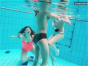 3 nude dolls have joy underwater