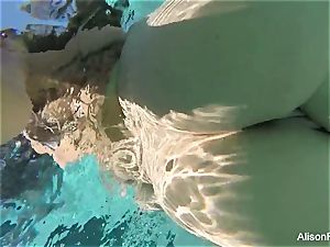 curvy Alison swims and wanks in the pool